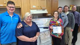 Illinois Valley Sunrise Rotary donates stove, cabinets, laptop to IV PADS homeless shelter