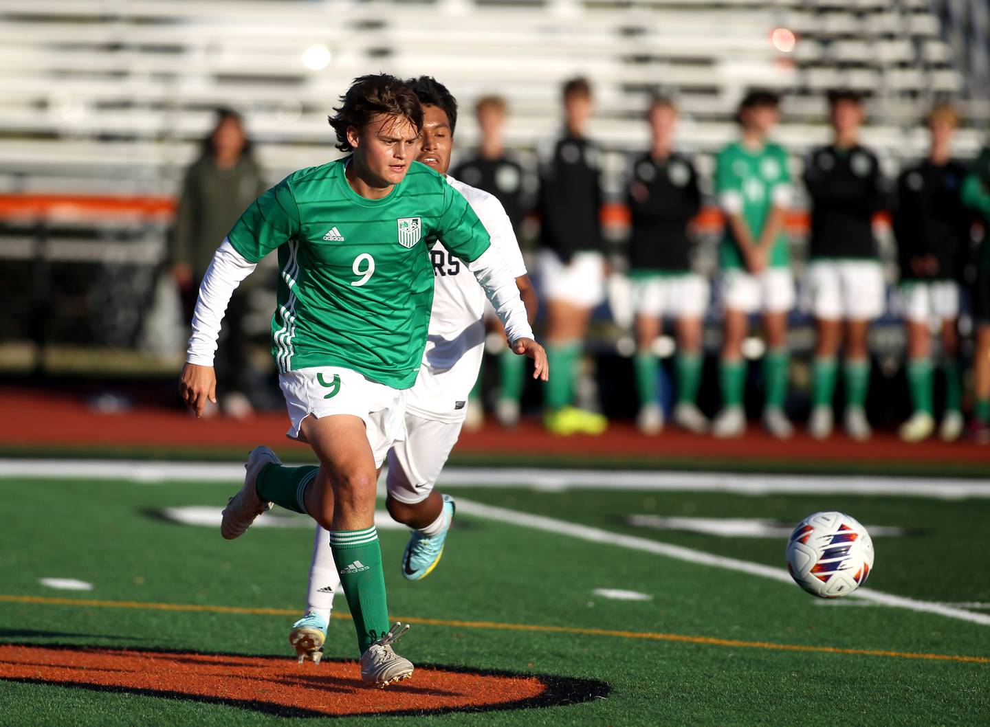 York’s Frankie Rofrano (9) goes after the ball during a Class 3A St. Charles East Sectional semifinal game against Addison Trail on Wednesday, Oct. 26, 2022.