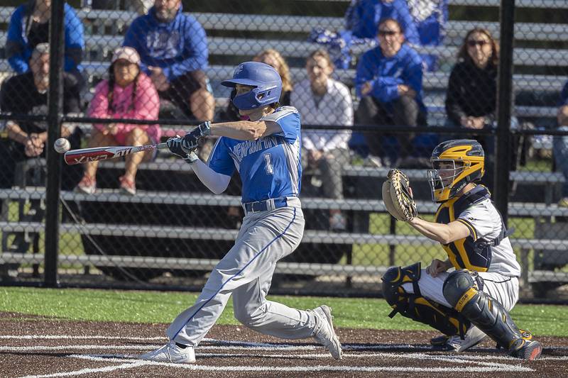 Newman’s Garret Matznick drives the ball for two rbi’s against Sterling Wednesday, May 3, 2023.