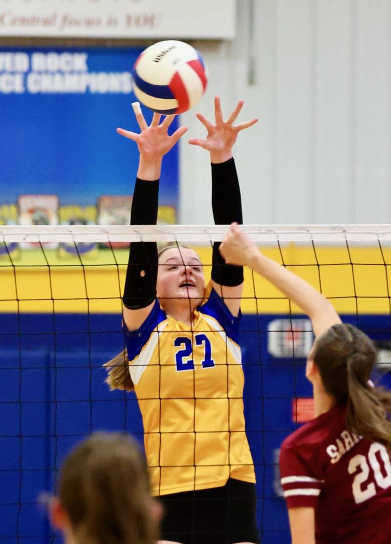 Princeton Logan's Kolbi Lawson puts up a block in Monday's Class 3A 8th grade sectional finals at Pannebaker Gym. The Lions fell in three sets to Morris Saratoga.