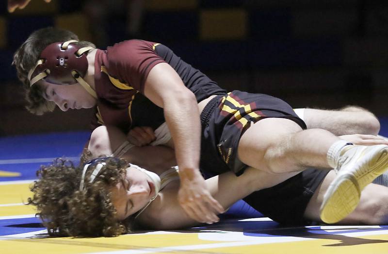 Richmond-Burton’s Emmett Nelson turn  Johnsburg’s Josh Key onto his back in the 144-pound match of a Kishwaukee River Conference wrestling meet on Thursday, Jan. 30, 2025, at Johnsburg High School.