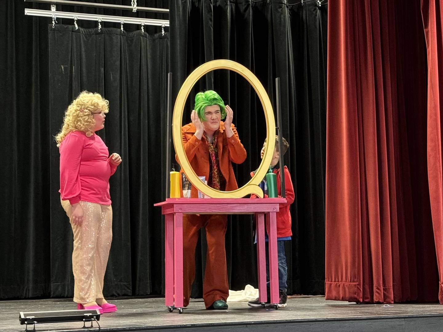 Matilda's father discovers that he now has green hair.