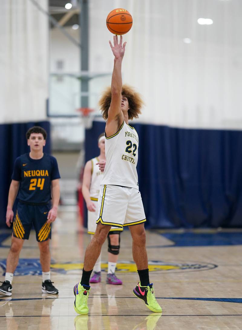 Yorkville Christian's Noah Aguado (22) shoots a free-throw  during a basketball game against Neuqua Valley at Yorkville Christian High School on Tuesday, February 4, 2025.