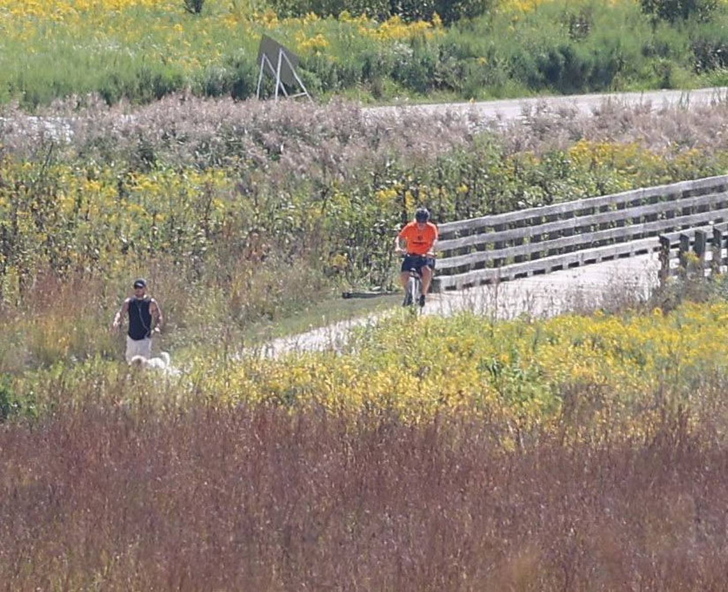 People enjoy the path at Hadley Valley Preserve on Thursday, Sept. 12, 2024 in Will County.