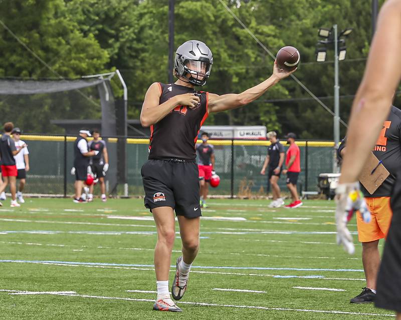 Minooka's Zane Caves warms up during the Downers Grove South 7 on 7 football tournament, July 12, 2025  in Downers Grove.