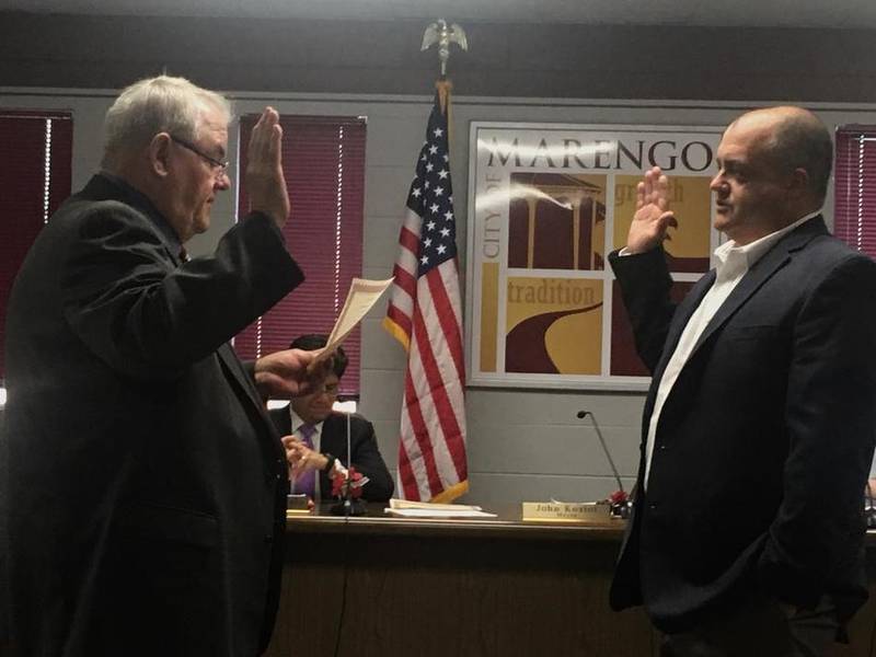 Outgoing Marengo Mayor Don Lockhart swears in John Koziol on Monday at the City Council meeting. Koziol defeated Lockhart in the April 4 election, coming in with 480 votes to Lockhart’s 391