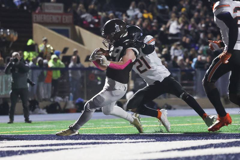 Joliet Catholic’s Keegan Farnaus runs in for his third touchdown in the first half against Leo on Friday, Oct. 6, 2023 in Joliet.