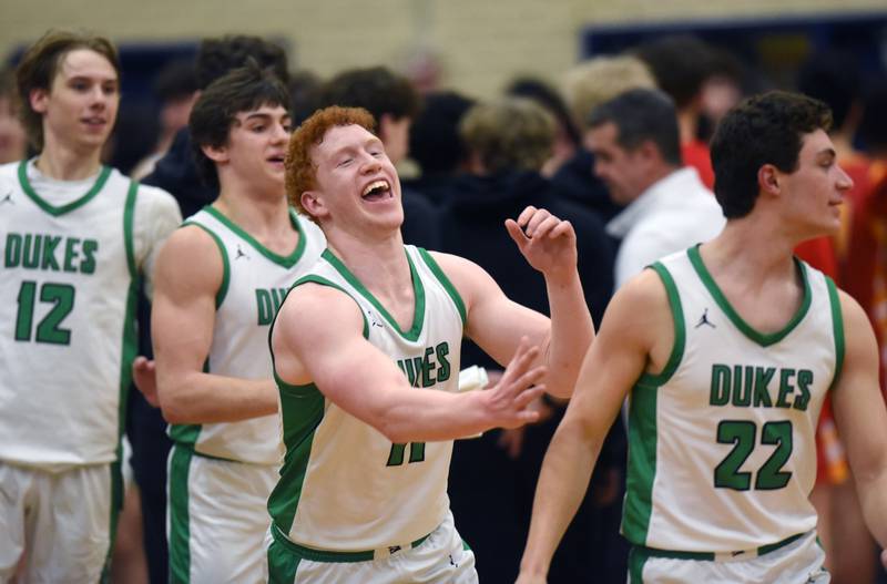 York’s Ryan Pechous celebrates the Dukes’ 52-44 victory over Batavia during the Addison Trail Class 4A boys basketball sectional semifinal on Wednesday, Feb. 28, 2024 in Addison.