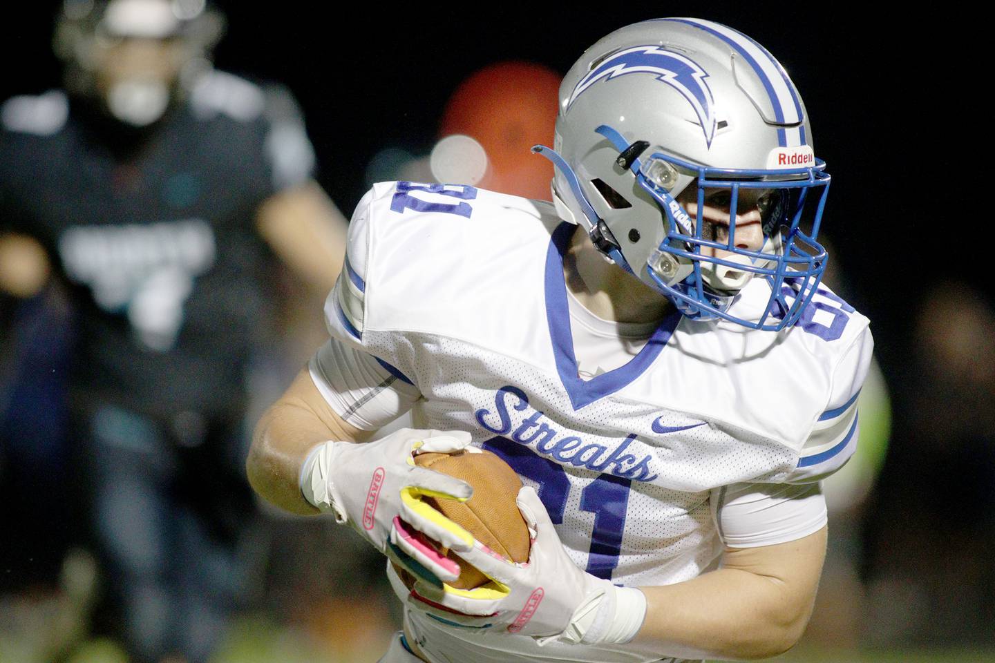 Woodstock’s Keaton Perkins runs for the end zone on a touchdown reception in varsity football at Woodstock North Friday night.