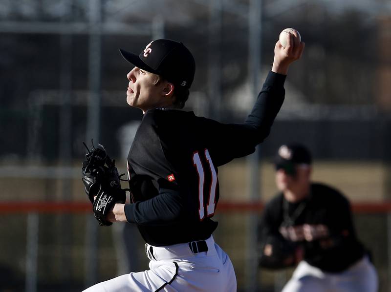 Crystal Lake Central's John Gariepy throws a pitch during a nonconference baseball game against Boylan Wednesday, March 29, 2023, at Crystal Lake Central High School.