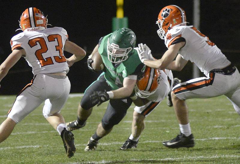 Seneca’s Collin Wright breaks through the Byron line on a run in the opening quarter Friday, Nov. 4, 2022, in Seneca.