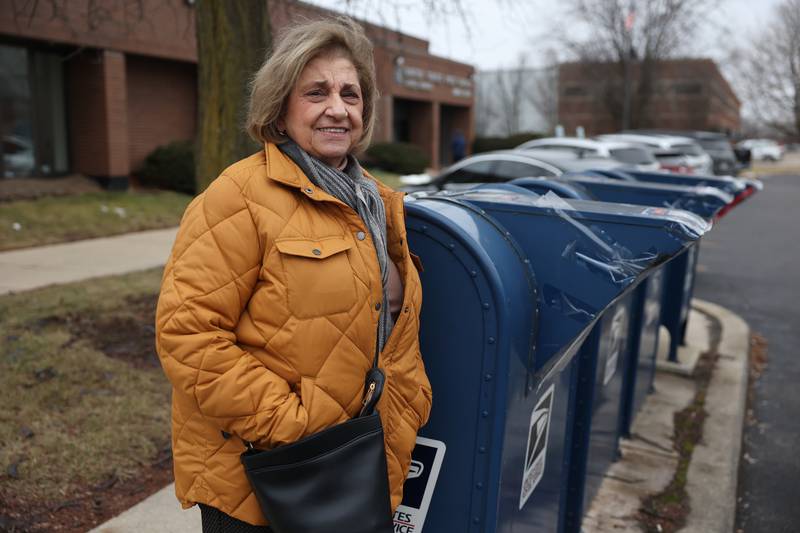 Isabell Camillo stands at the McDonough Street Post Office. Camillo mailed out four checks that have not cleared and she suspects they were stolen so she filed a police report with Joliet police on Jan. 10, 2023.