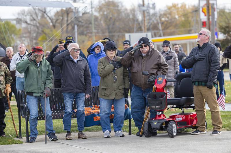 Veterans salute as the colors are presented Tuesday, Nov. 11, 2025, during the Veterans Day ceremony in Dixon.