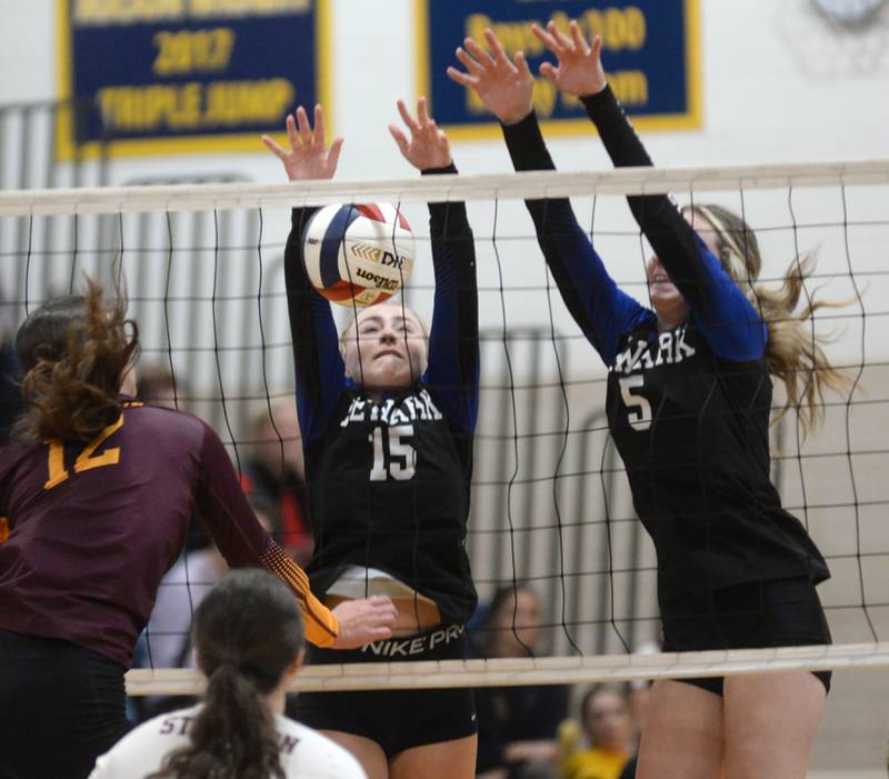 Newark's Taylor Jeffers (15) and Addison Long (5) block against Stockton during 1A action at the Polo Sectional on Tuesday, Nov. 5, 2024 at Polo High School.