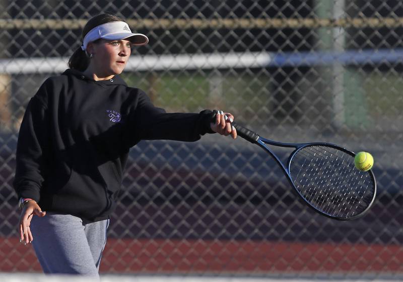 Wauconda's Reagan Mohr returns the ball Thursday, Oct. 23, 2025, during the first day of the IHSA State Girls Tennis Tournament at Schaumburg High School.