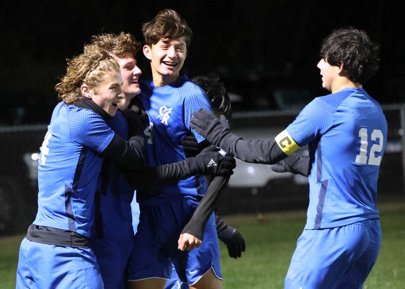 Burlington Central players celebrate after scoring the first goal of the game against Sycamore Tuesday, Oct. 21, 2025, during their IHSA Class 2A regional semifinal match at Burlington Central High School.