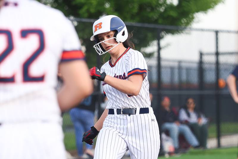 Romeoville’s Alexis Estrada scores on a passed ball against Joliet Central on Tuesday, April 28, 2026 in Romeoville.