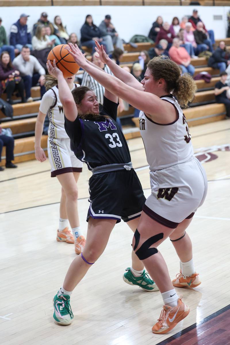 Manteno's Brooke Blanchette is guarded by Watseka/Milford's Taylor Chattic during Manteno's 57-52 victory on Wednesday, Jan. 21, 2026.