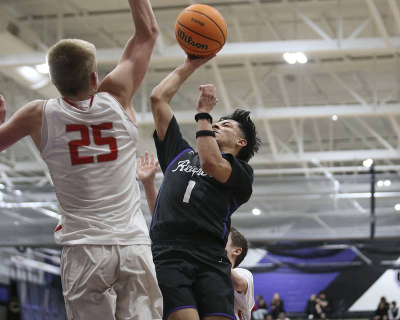 Plano's Alan Contreras (1) puts up a shot off of a drive during their Plano Christmas Classic basketball game between Streator at Plano Friday, Dec 26, 2025 in Plano.