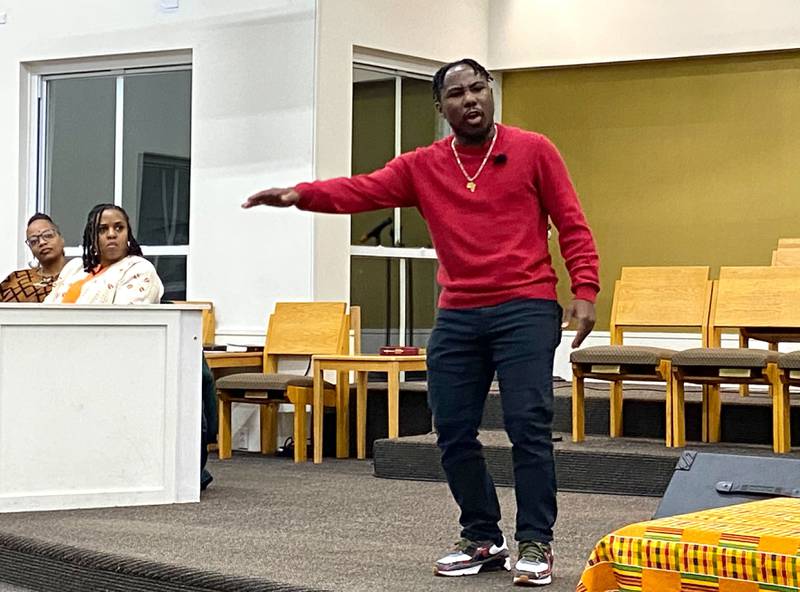 Darius Jackson performs a slam poem about Martin Luther King, Jr. and America during a celebration event for MLK Day on Monday, Jan. 20, 2025, at New Hope Missionary Baptist Church, 1201 Twombly Road, DeKalb. The event was hosted by New Hope in collaboration with multiple area churches.