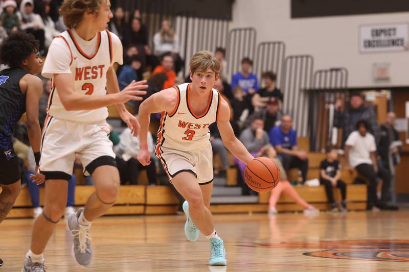 Lincoln-Way West’s Jacob Willis makes a move against Lincoln-Way East.
