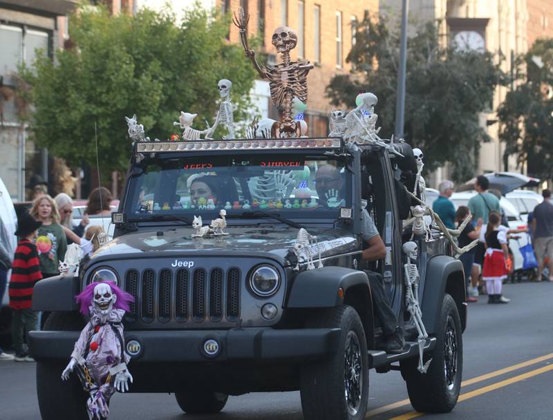 Skeltons cover a Jeep during the 6th annual Halloween parade on Saturday, Oct. 12, 2024 downtown Princeton.