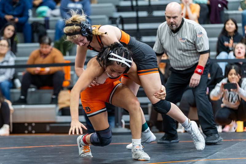 DeKalb’s Larisza Gomez-Guevara and Minooka’s Marian Nordsell compete in the 110 lb finals during the Minooka Girls Wrestling Thanksgiving Throwdown competition at Minooka High School on Nov. 26, 2026.