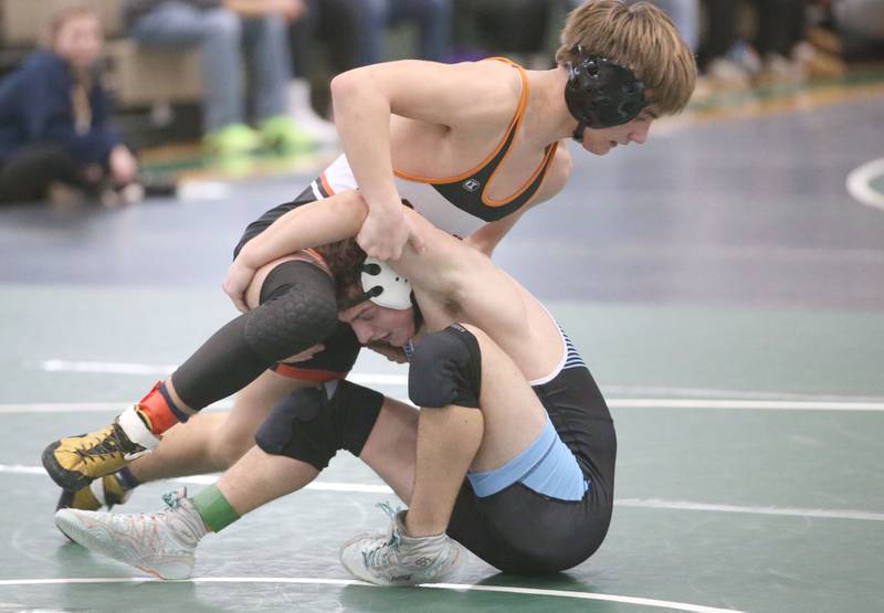 Marquette's Beau Thompson wrestles Sandwich's Jaxsen Blanchard in the 138 pound weight class during the Class 1A Regional meet on Saturday, Feb. 8, 2025 at St. Bede Academy.