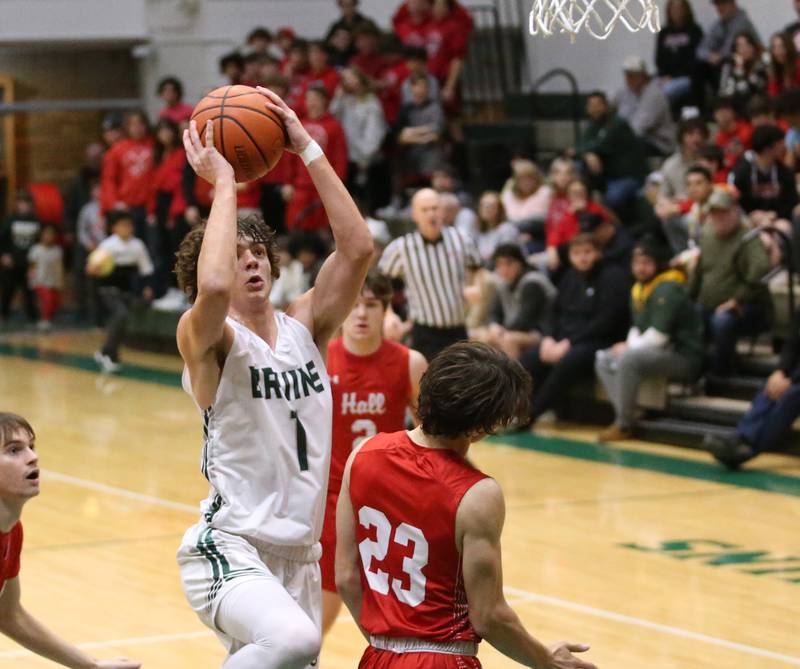 St. Bede's Connor Brown (left) runs in the lane to score over Hall's Braden Curran (right) on Monday, Dec. 14, 2022 at St. Bede Academy.