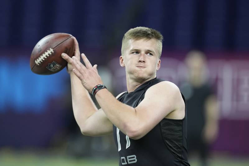 Western Kentucky quarterback Bailey Zappe runs a drill during the NFL Scouting Combine on March 3, 2022 in Indianapolis.