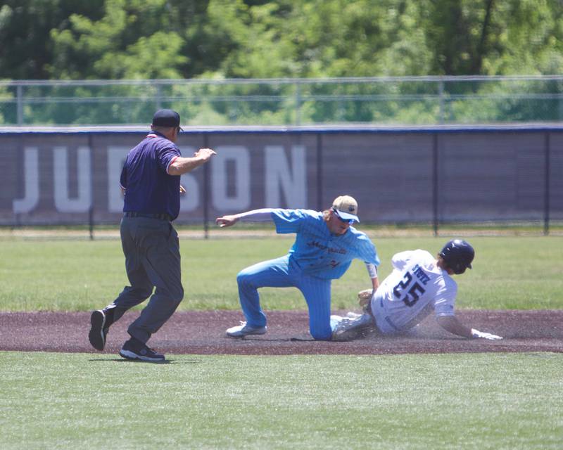 Marquette's Anthony Couch tags out Harvest Christian's Ben Mitchell at second base in the seventh inning at the Class 1A Sectional Final on Saturday May 25, 2024 in Elgin.