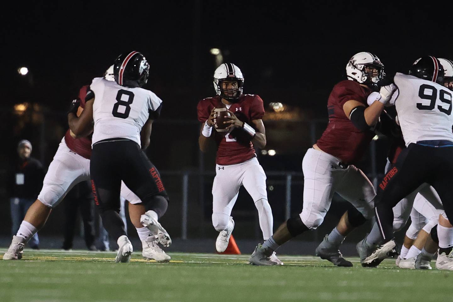 Plainfield North’s Demir Ashiru looks to pass against Rich Township in the 1st round of the playoffs on Friday.