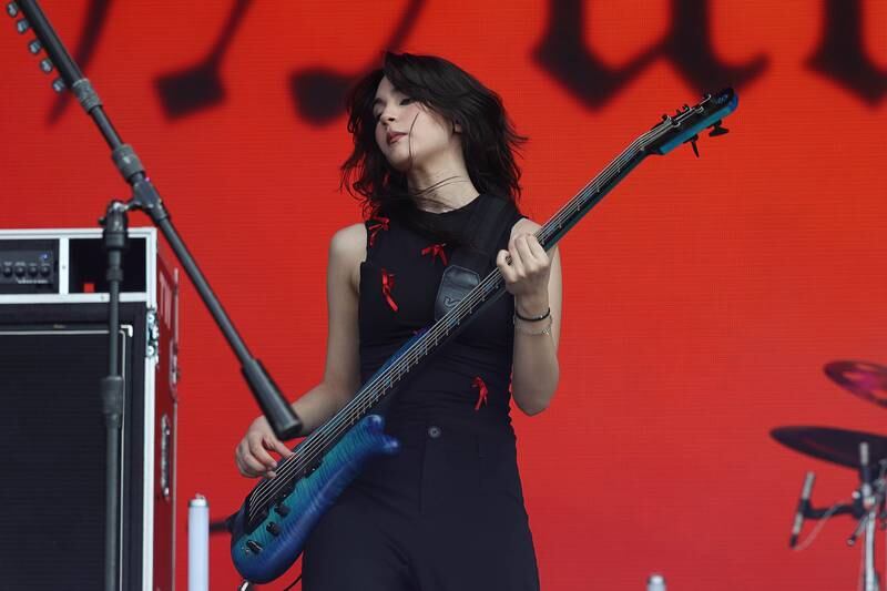 Alejandra Villarreal of The Warning plays the bass at Riot Fest on Friday, Sept. 20, 2024 in Chicago.