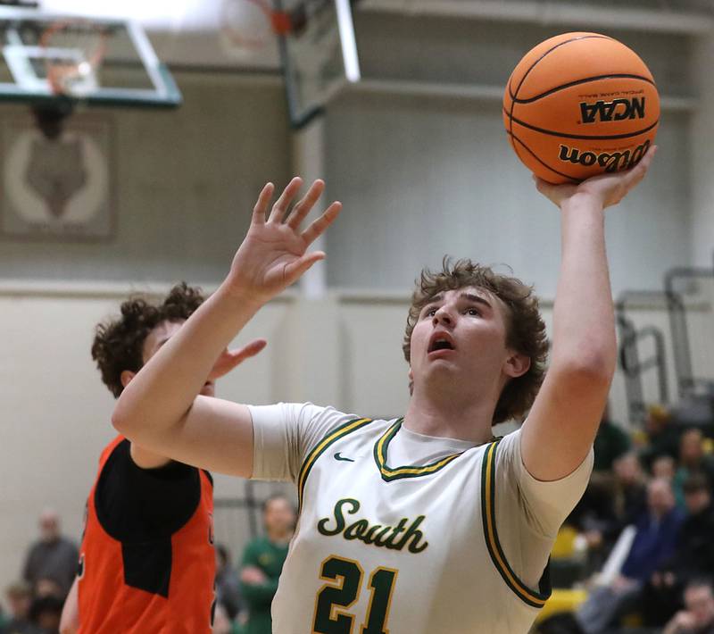 Crystal Lake South's Ryan Morgan drives to the Bakst against Crystal Lake Central during an IHSA Class 3A Crystal Lake South Regional boys basketball semifinal game on Wednesday, February, 25, 2026, at Crystal Lake South High School.