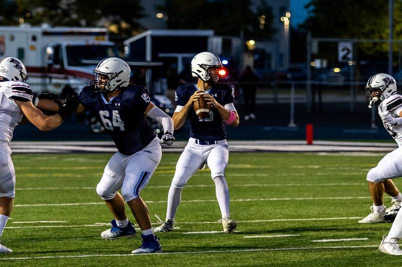 Plainfield South's Cody Hogan scans the field against Plainfield North on Sept. 13, 2024.