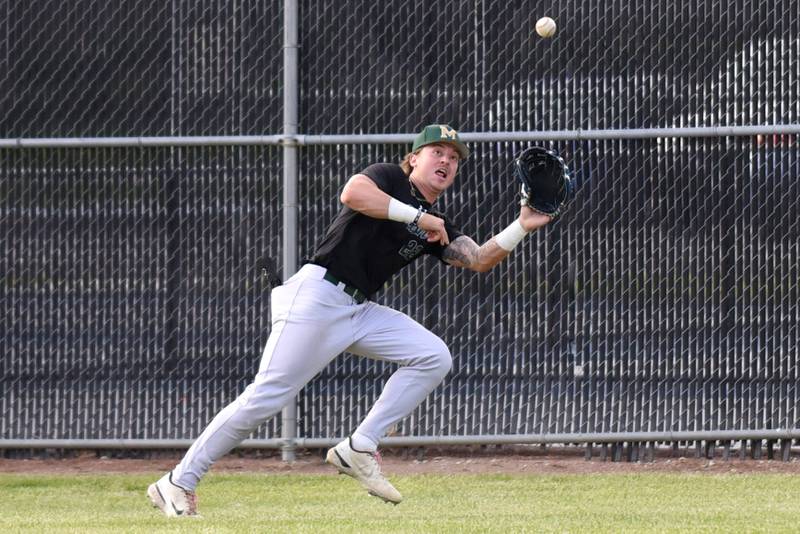 Bishop McNamara's Dom Panozzo tracks down a fly ball during the Class 2A Beecher Sectional semifinals Thursday, May 29, 2025.