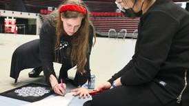 NIU students aim for Guinness World Record with world’s largest paper snowflake
