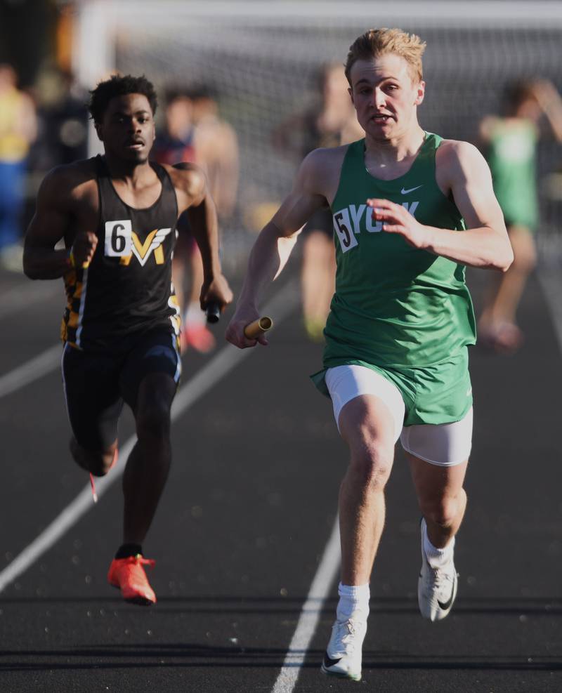 York anchor Justin Cello runs for the finish line for a victory for the Dukes in the 400-meter relay during the DuPage County boys track and field meet at Wheaton Warrenville South High School on Friday, May 9, 2025 in Wheaton.