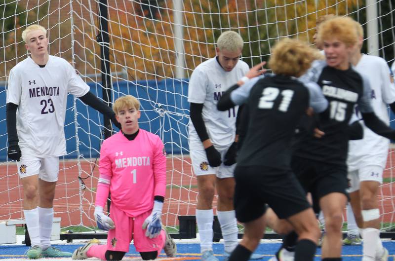 Mendota players Alex Beetz, keeper Mateo Goy and Casar Casas, react as Colombia players score a goal during the Class 1A State title game on Saturday, Nov. 8, 2025 at Hoffman Estates High School.