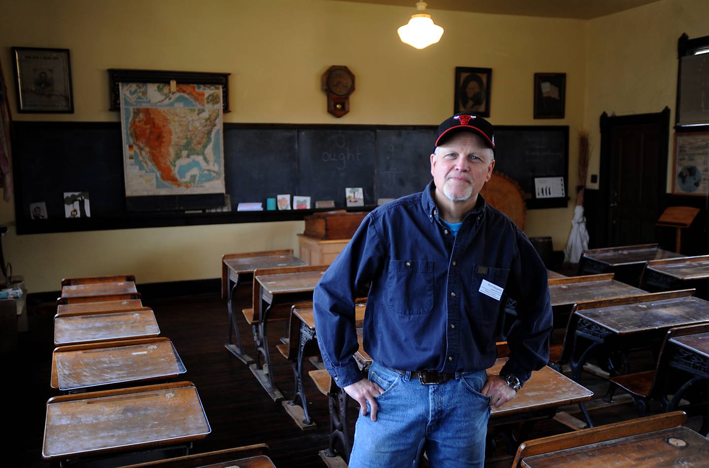 Kurt Begalka, the administrator of the McHenry County Historical Society and Museum, 6422 Main St. in Union, is photographed inside the museum's 1895 West Harmony School on Thursday, April 14, 2022.