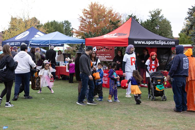 Locals trick or treat at BatFest on Saturday, Oct. 25, 2025, in Batavia.
