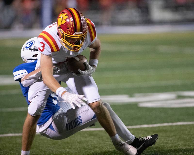 Batavia's Thomas Prescot is tackled by Geneva's Dylan Alcaraz on Friday, Oct. 3, 2025 in Geneva.