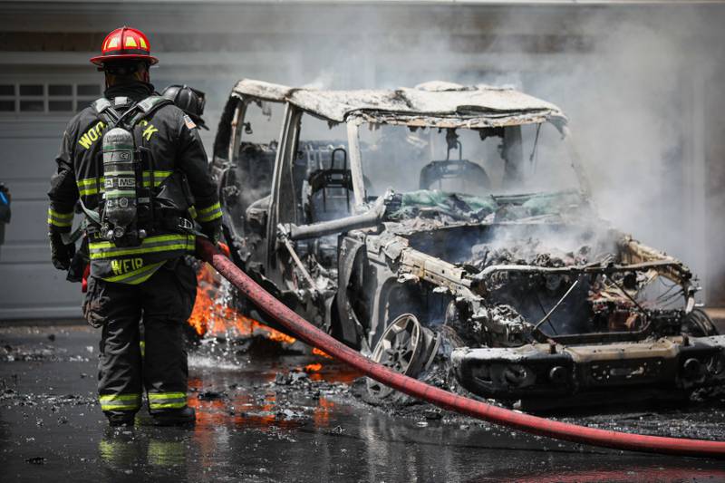 Woodstock Fire/Rescue District crews put out a vehicle fire on Friday, July 5, that gutted a late-model Jeep sitting at the top of a 900-foot-long driveway.