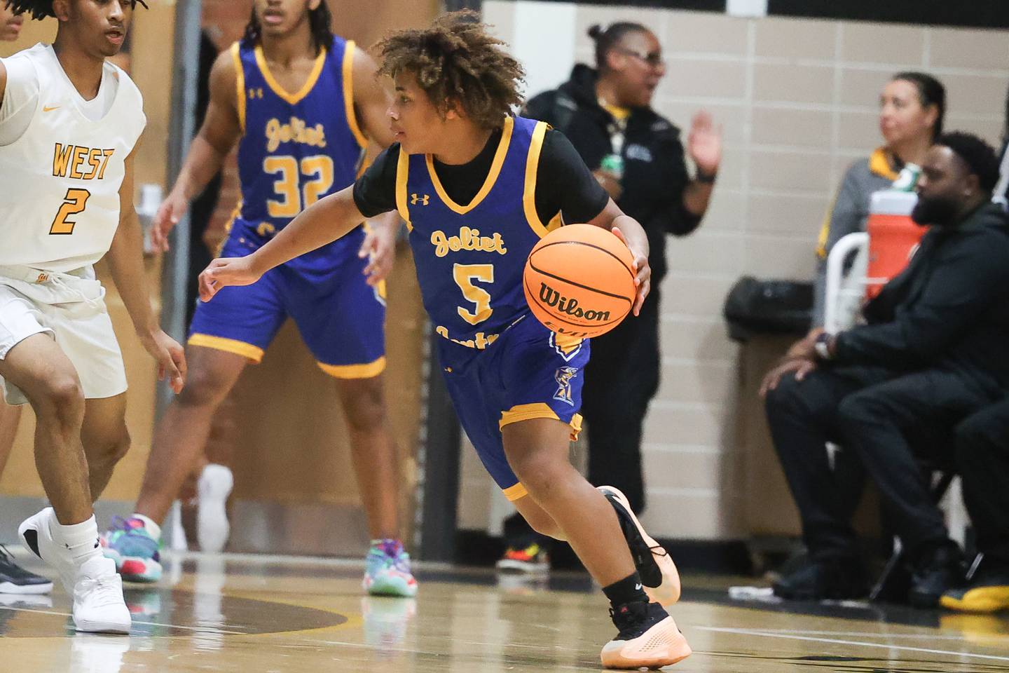 Joliet Central’s Michael Stokes works the top of the key against Joliet West on Tuesday, Dec. 3, 2024 in Joliet.