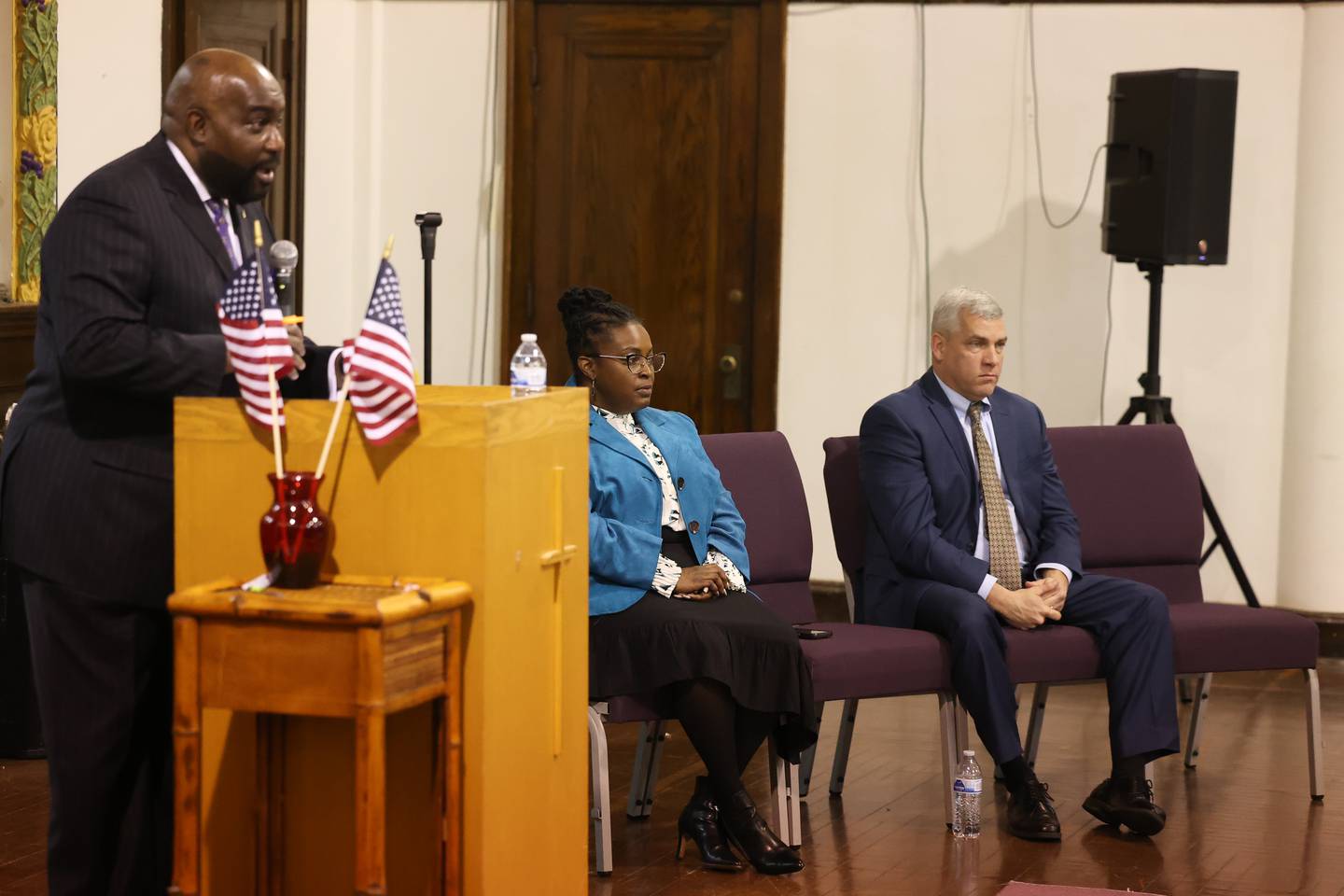 Joliet mayor candidate Tycee Bell (center) and Mayor Bob O’Dekirk attend a moderated mayoral candidate forum at New Canaanland Christian Church in Joliet on Saturday, March 25, 2023 in Joliet.
