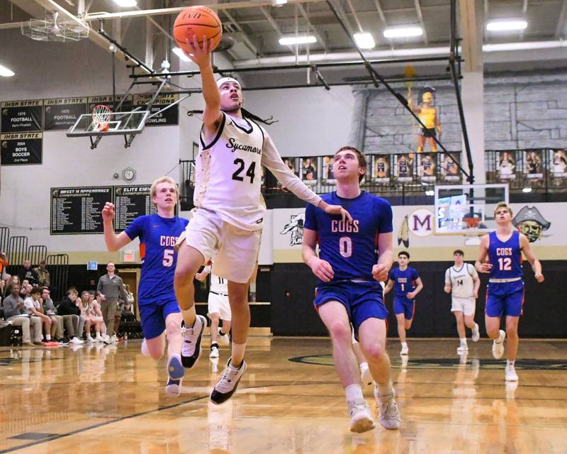 Sycamore's Unique Shaw (24) makes a shot during the game on Wednesday Feb. 19, 2025, while taking on Genoa-Kingston High School held at Sycamore High School.