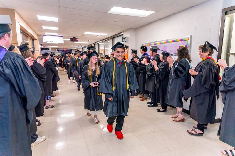 Graduates are applauded by McHenry County College faculty and staff on May 17, 2025, after the Spring Commencement Ceremony.