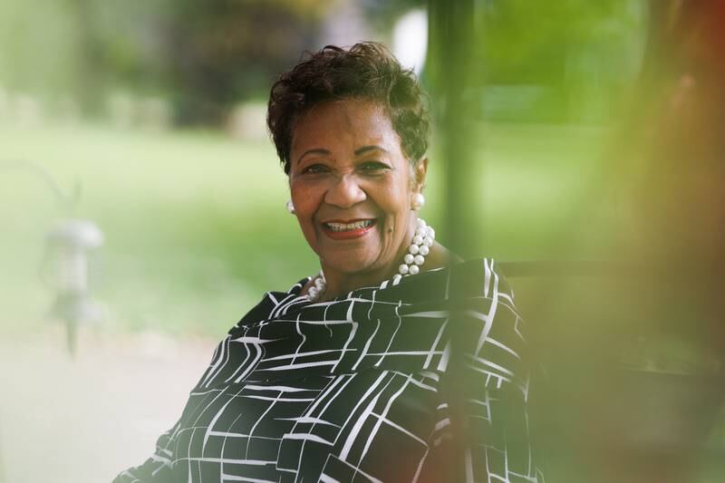 Denise Winfrey poses for a photo in her backyard on Wednesday, Aug. 30, 2023 in Joliet.