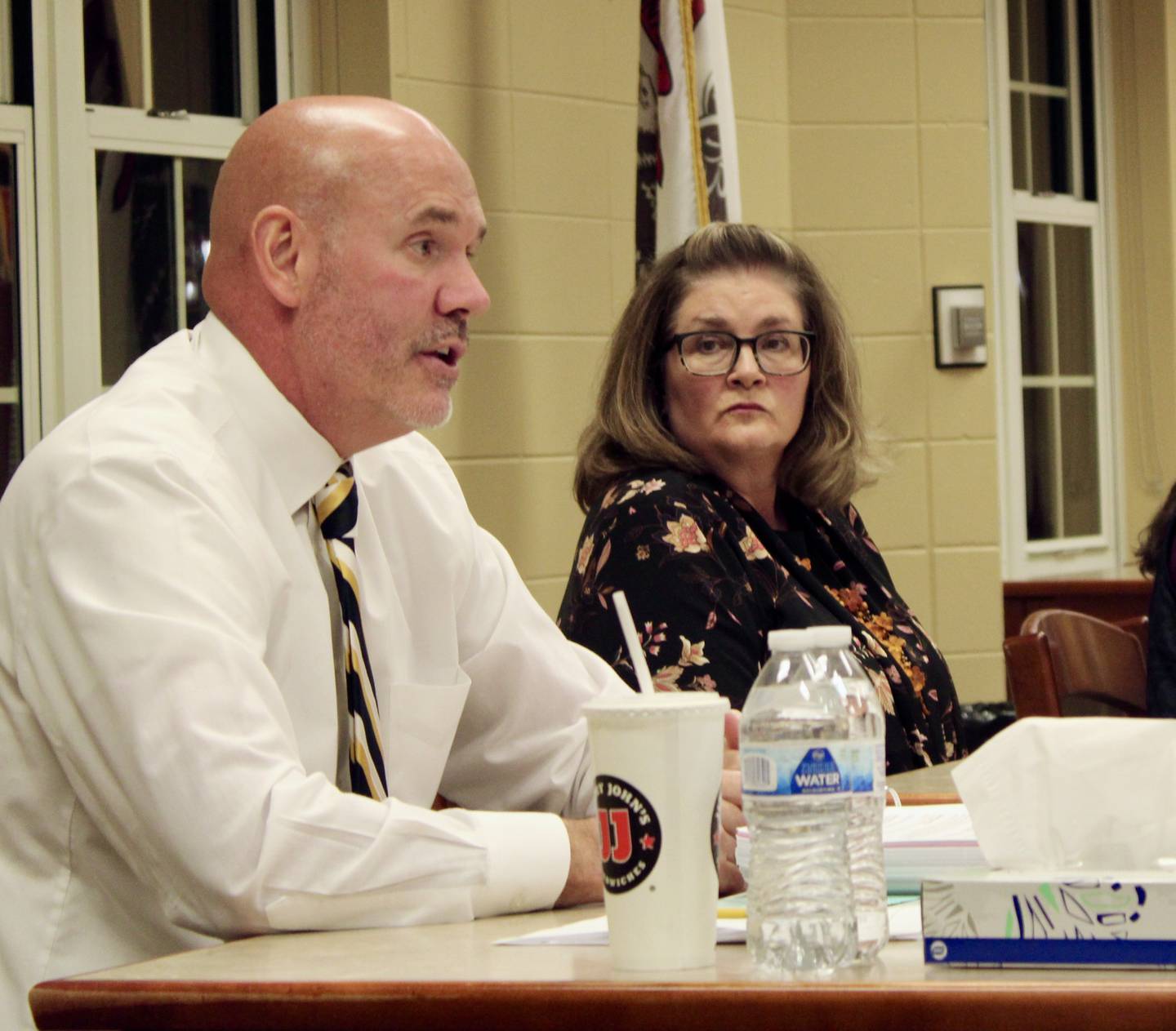 Sterling Public Schools Superintendent Tad Everett and board of education President Pam Capes review the district's participation in a county-wide disaster plan on Wednesday during a board of education meeting.