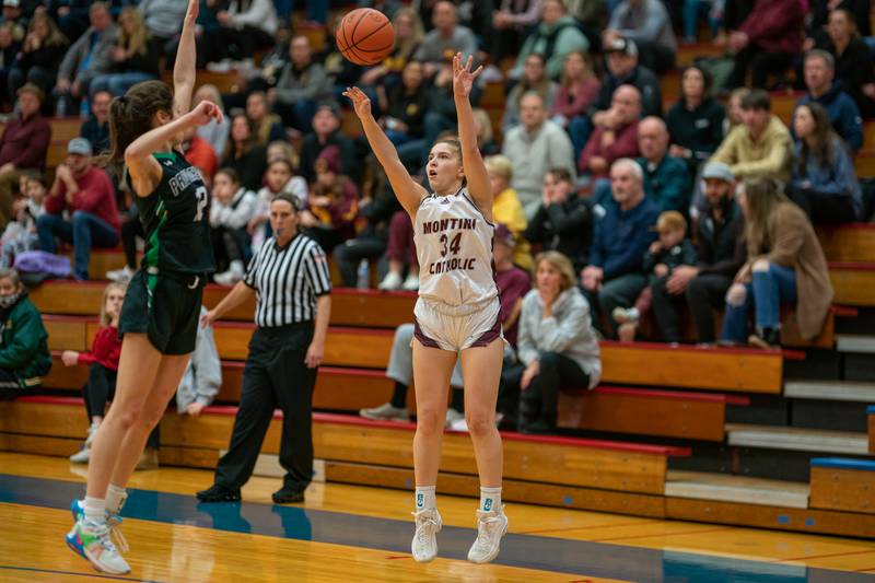 Montini’s Lily Spanos (34) shoots a three-pointer against Providence's Bella Morey (12) during the 3A Glenbard South Sectional basketball final at Glenbard South High School in Glen Ellyn on Thursday, Feb 23, 2023.